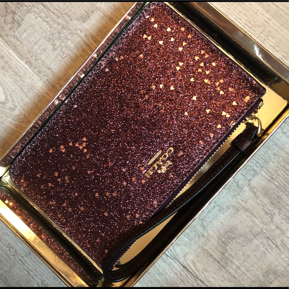 Sparkly maroon coach wristlet